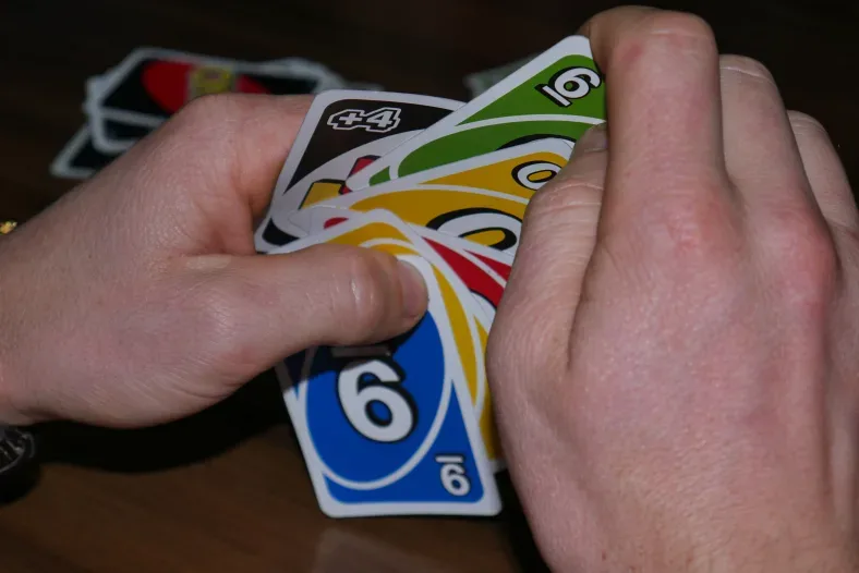 What Does The Shuffle Hands Card Mean In UNO