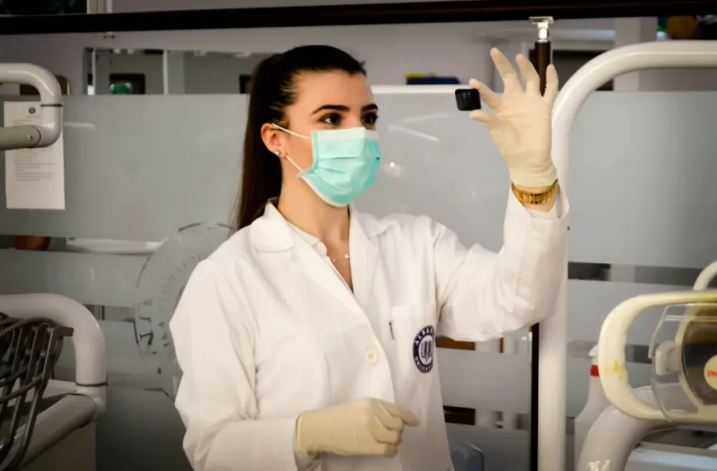 A healthcare professional examines an integrative health sample.