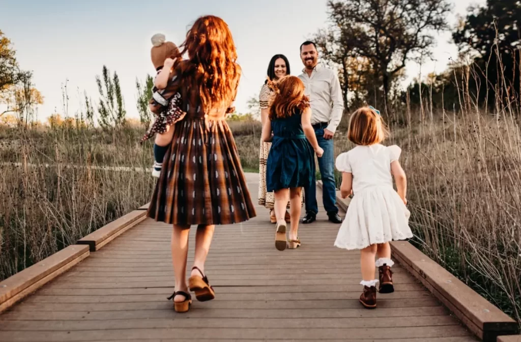 Best family truck - family walking on a wooden path