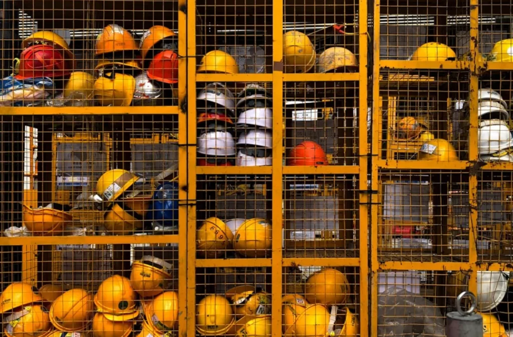 Hard hats stored for safety orientation course participants.