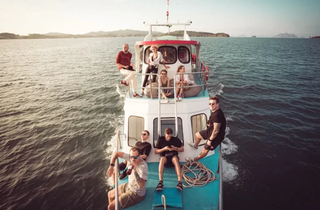 Group enjoying a sailing trip on open water.