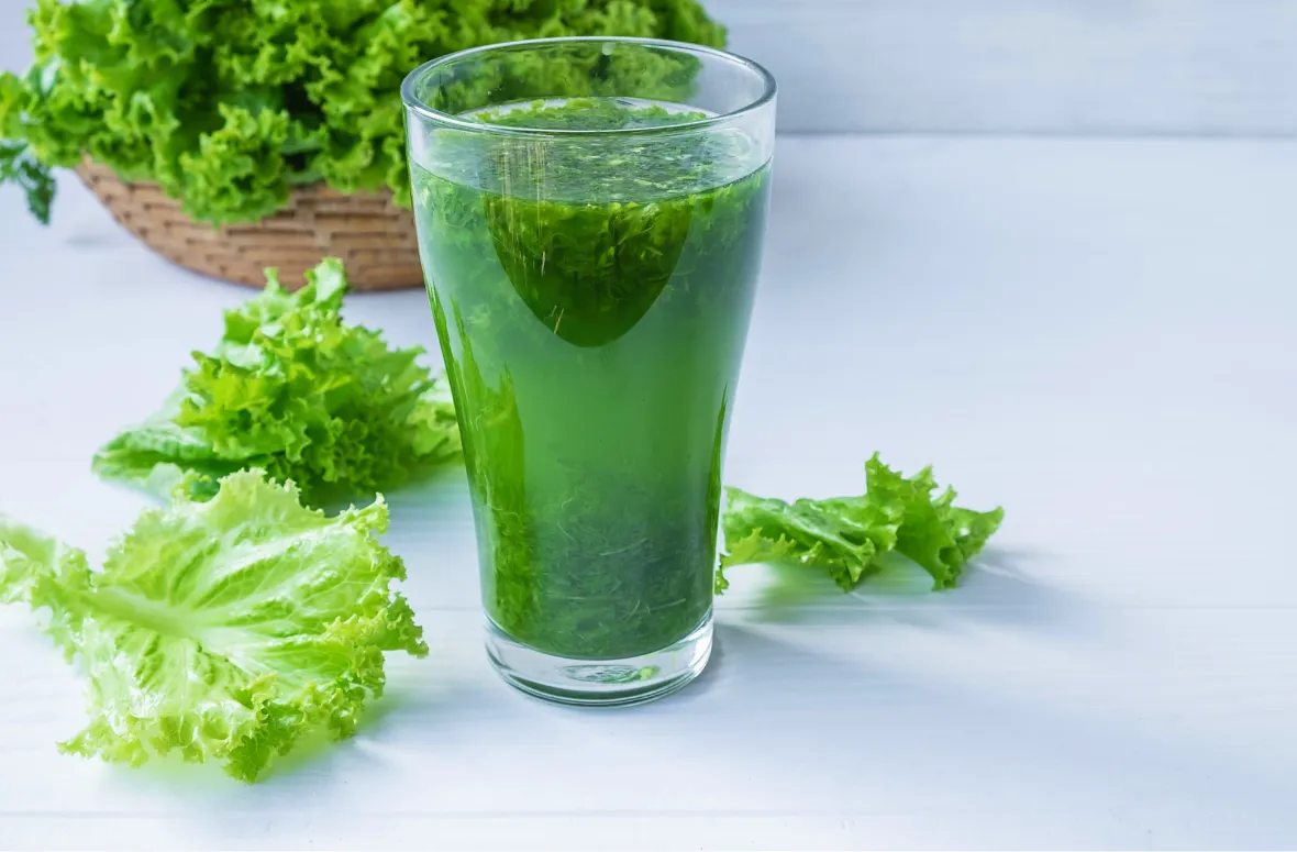 Fresh green lettuce juice, drink nutrition facts highlight.