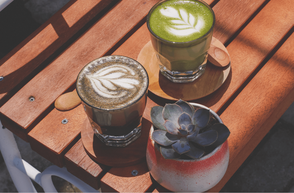 Health drinks with a succulent in a red and white pot